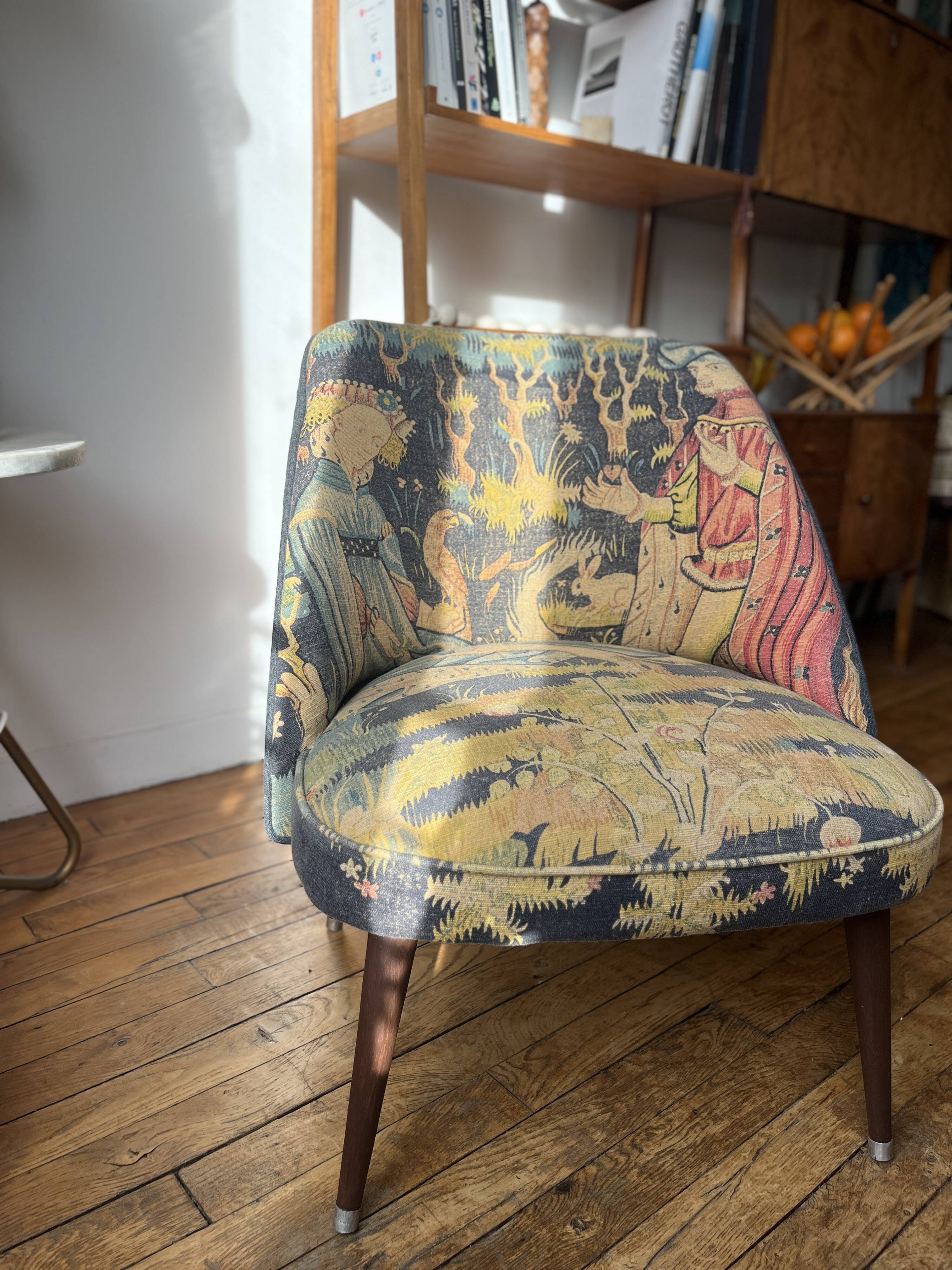 J. Tenreiro, Brazil. Concha armchair with tapered legs, Cluny tapestry 1400.