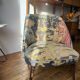J. Tenreiro, Brazil. Concha armchair with tapered legs, Cluny tapestry 1400.