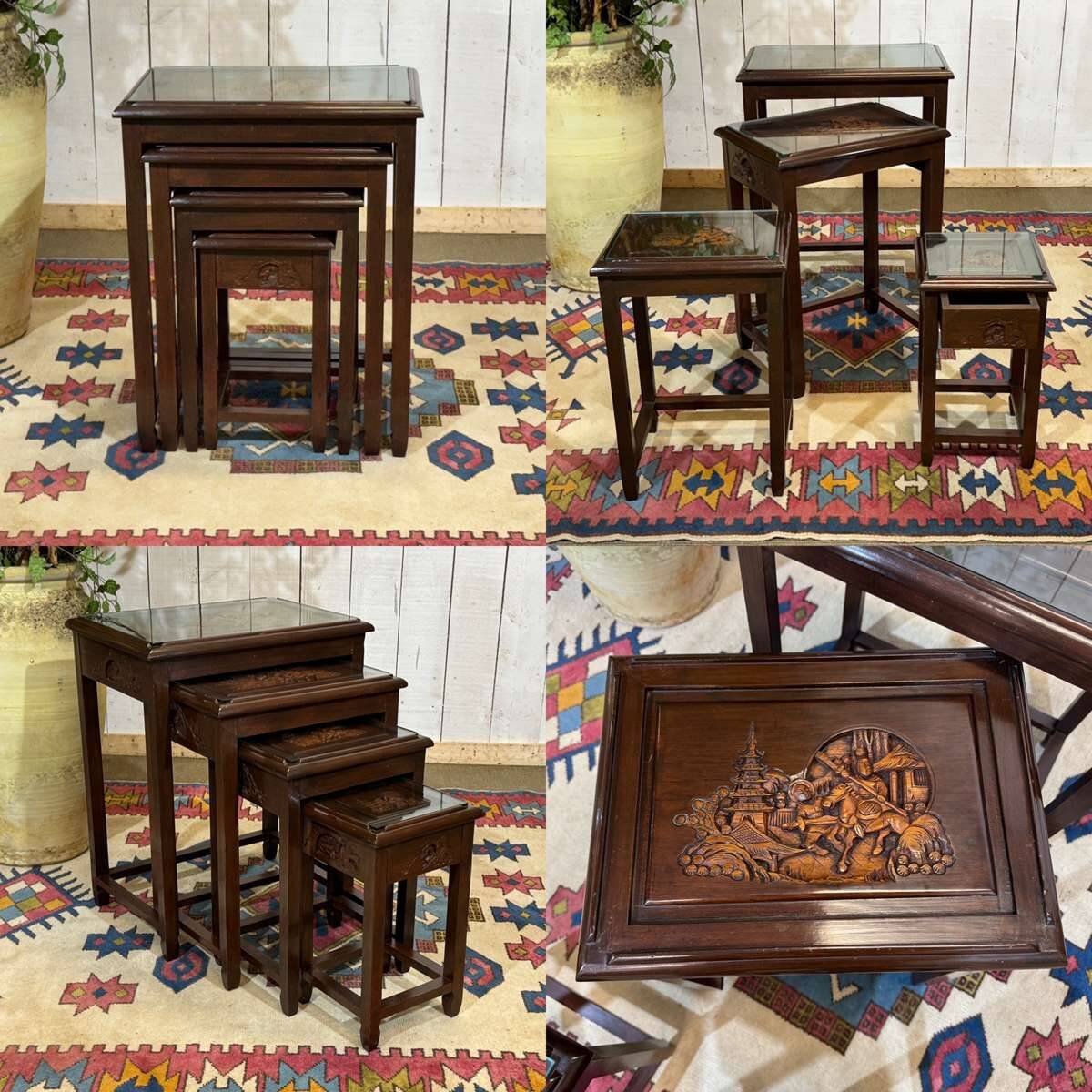 Set of 4 Chinese nesting tables in teak from the 1980s.
