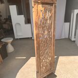 Rectangular Indonesian construction element with blue and yellow plant in carved wood