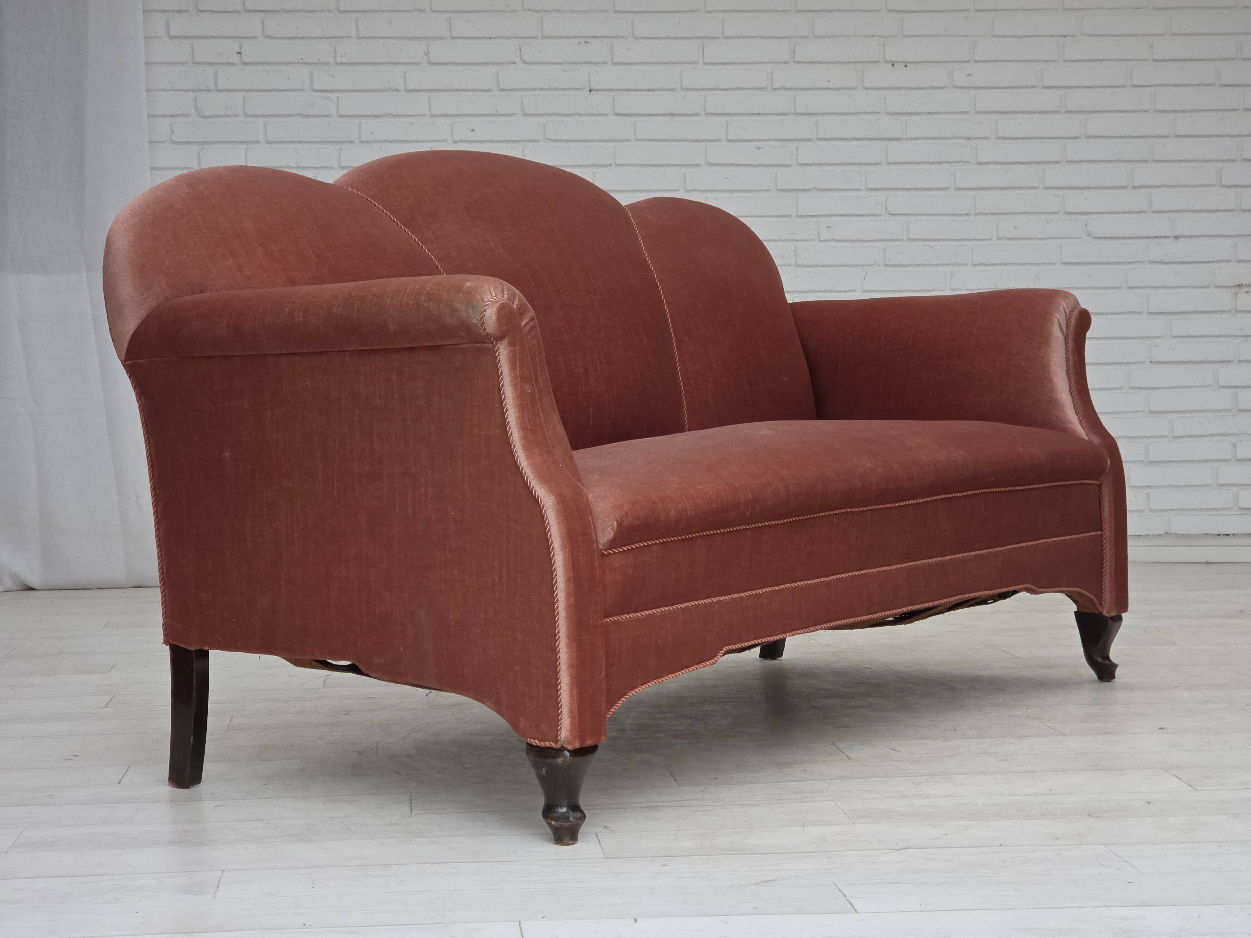 1950s, Danish 2-seater sofa, salmon pink furniture velour, oak wood legs.