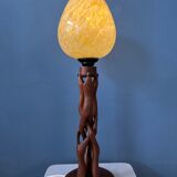 Hand-carved wooden table lamp with art deco lampshade