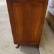 Solid walnut sideboard, moustache legs, black marble top.