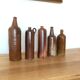 Set of 5 antique glazed stoneware bottles