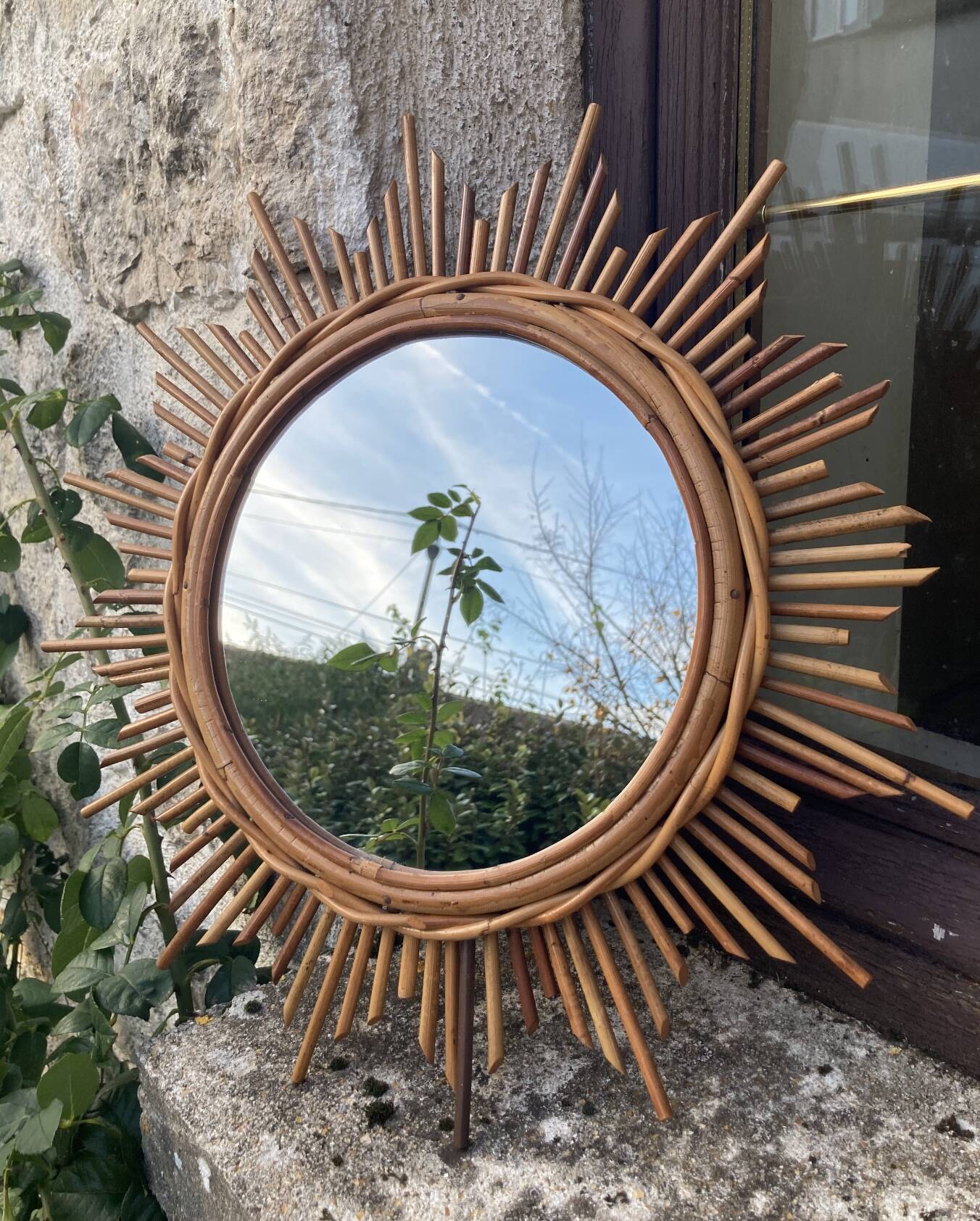 Vintage rattan sun mirror