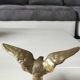 Eagle figurine sculpture with outstretched wings, in solid brass. Size 8 x 15 cm