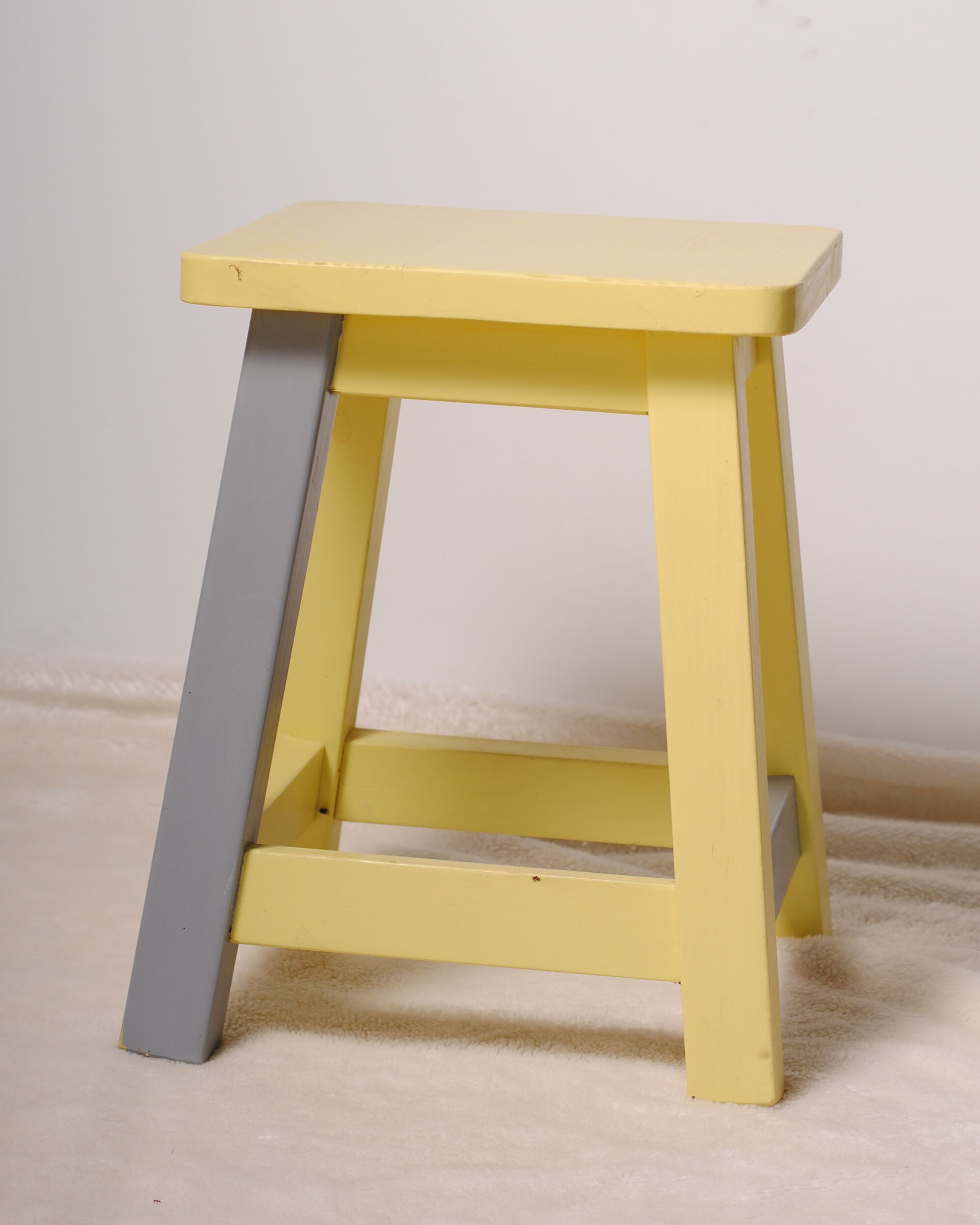 Yellow child office with his stool