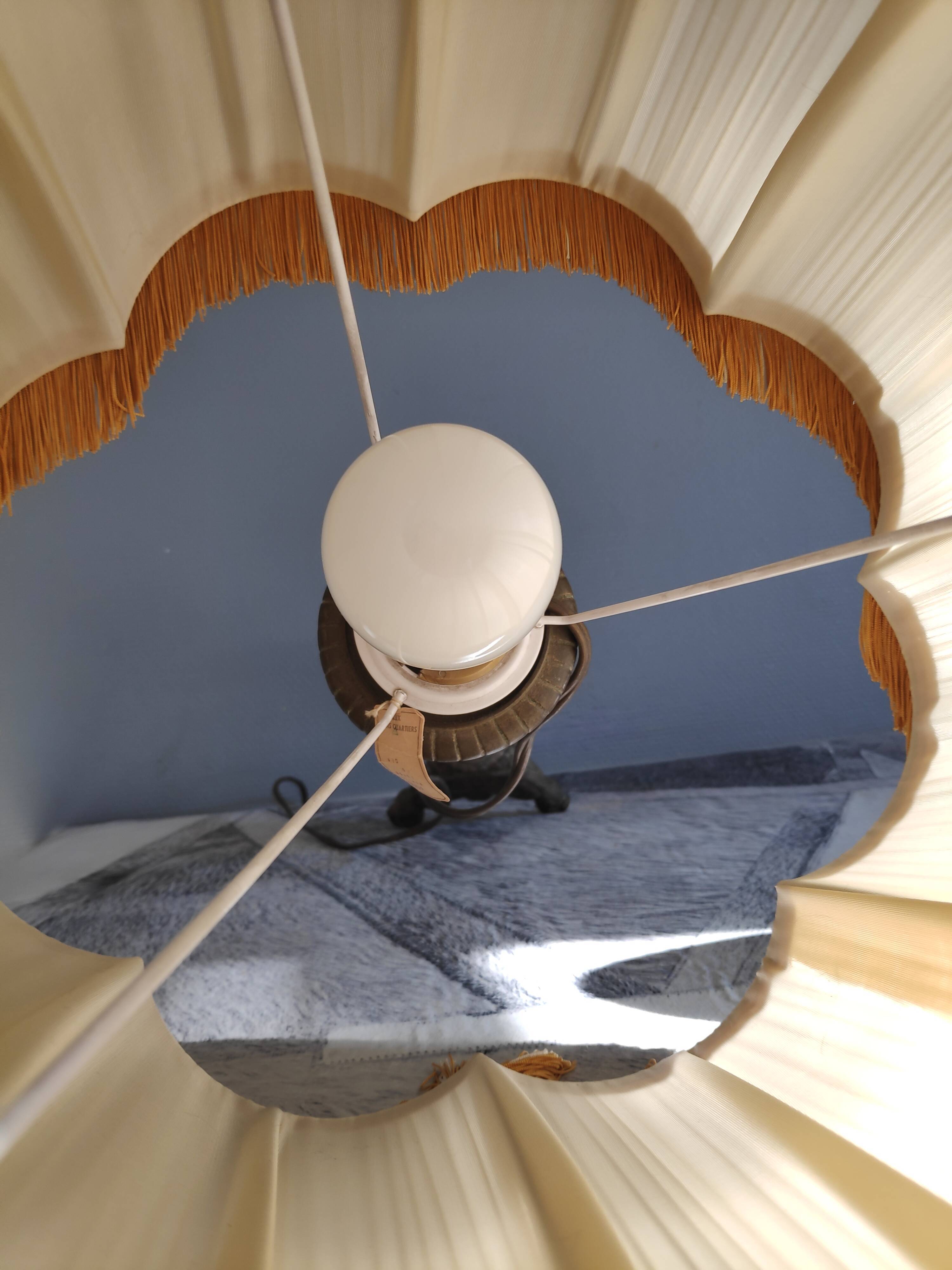 Old brass foot lamp and period lampshade