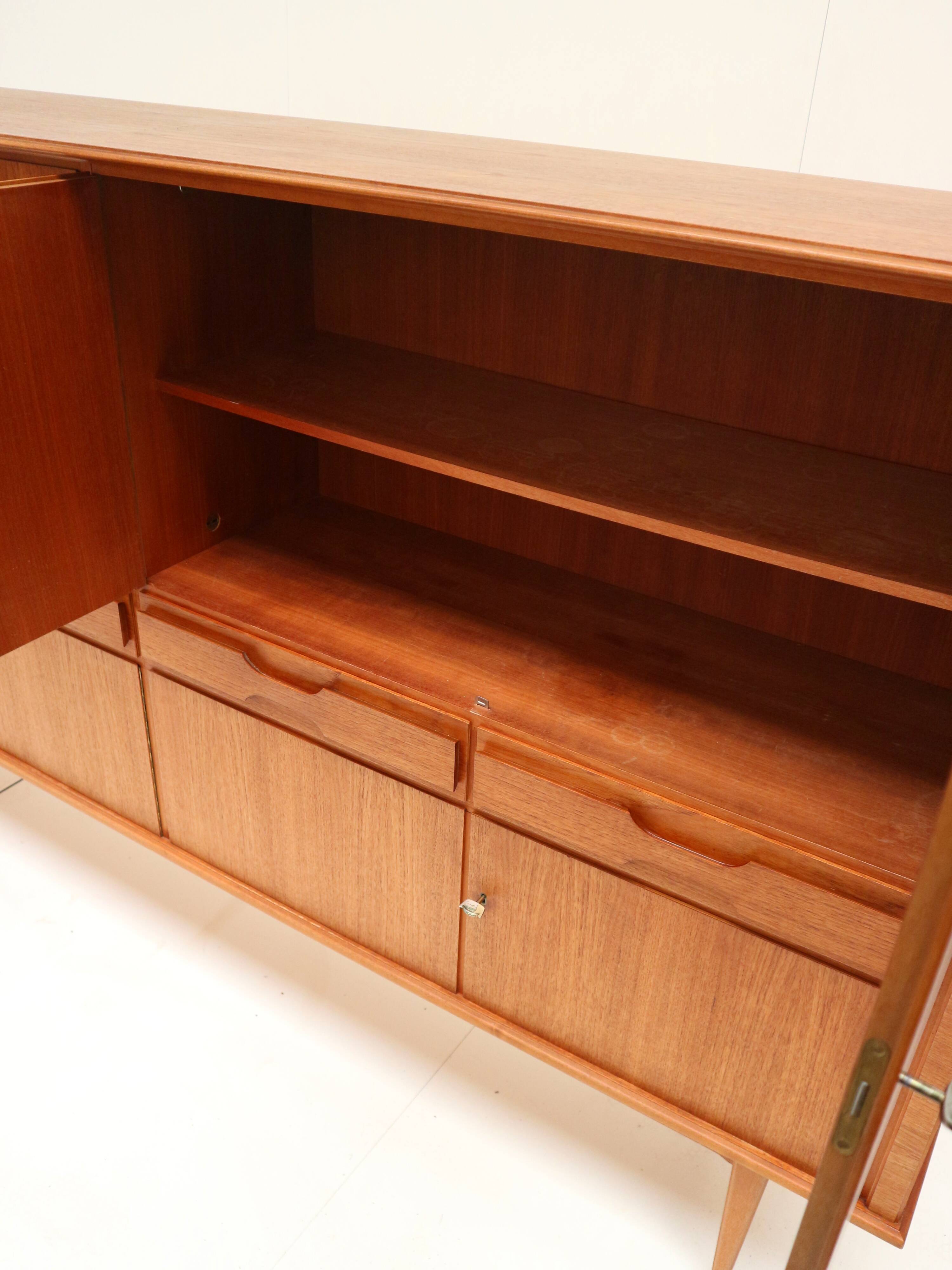Large vintage teak highboard made in the 60s