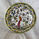Decorative plate with medieval, Breton and rabbit decoration surrounded by plants - Breton earthenware