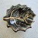 Black and gold leaf cup