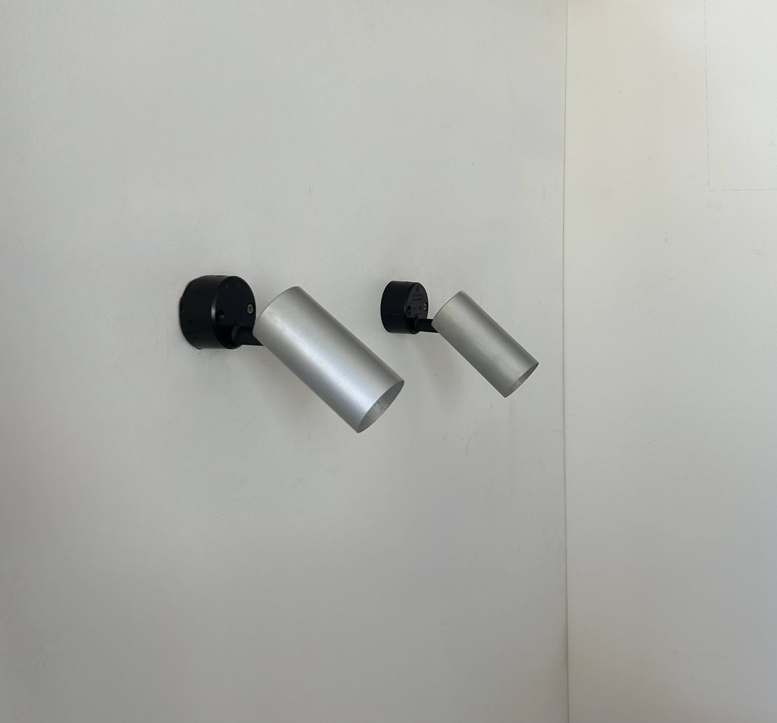 Pair of vintage adjustable brushed aluminum wall lights, France, 1970s