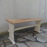 Re-enchanted bench in beige finish, with a waxed wood seat.