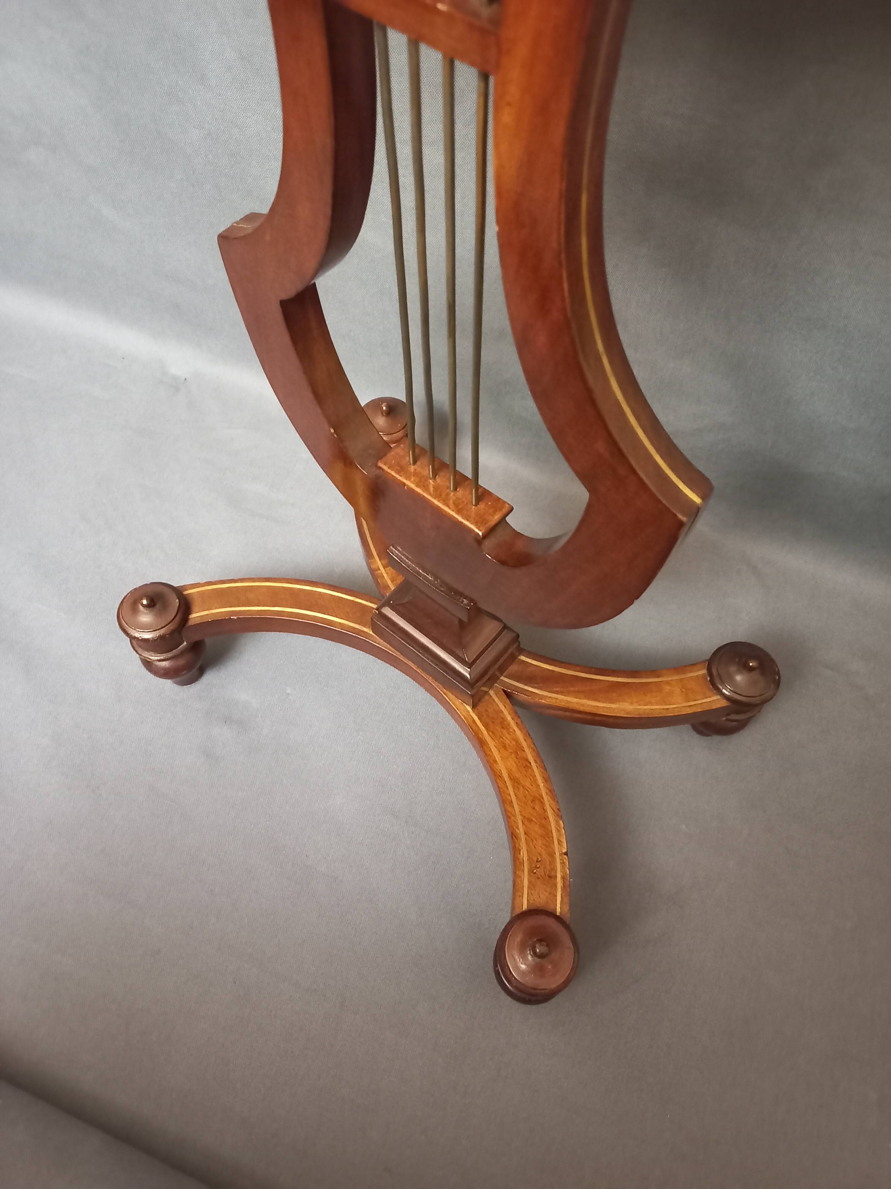 Small Lyre guéridon table, 19th century.