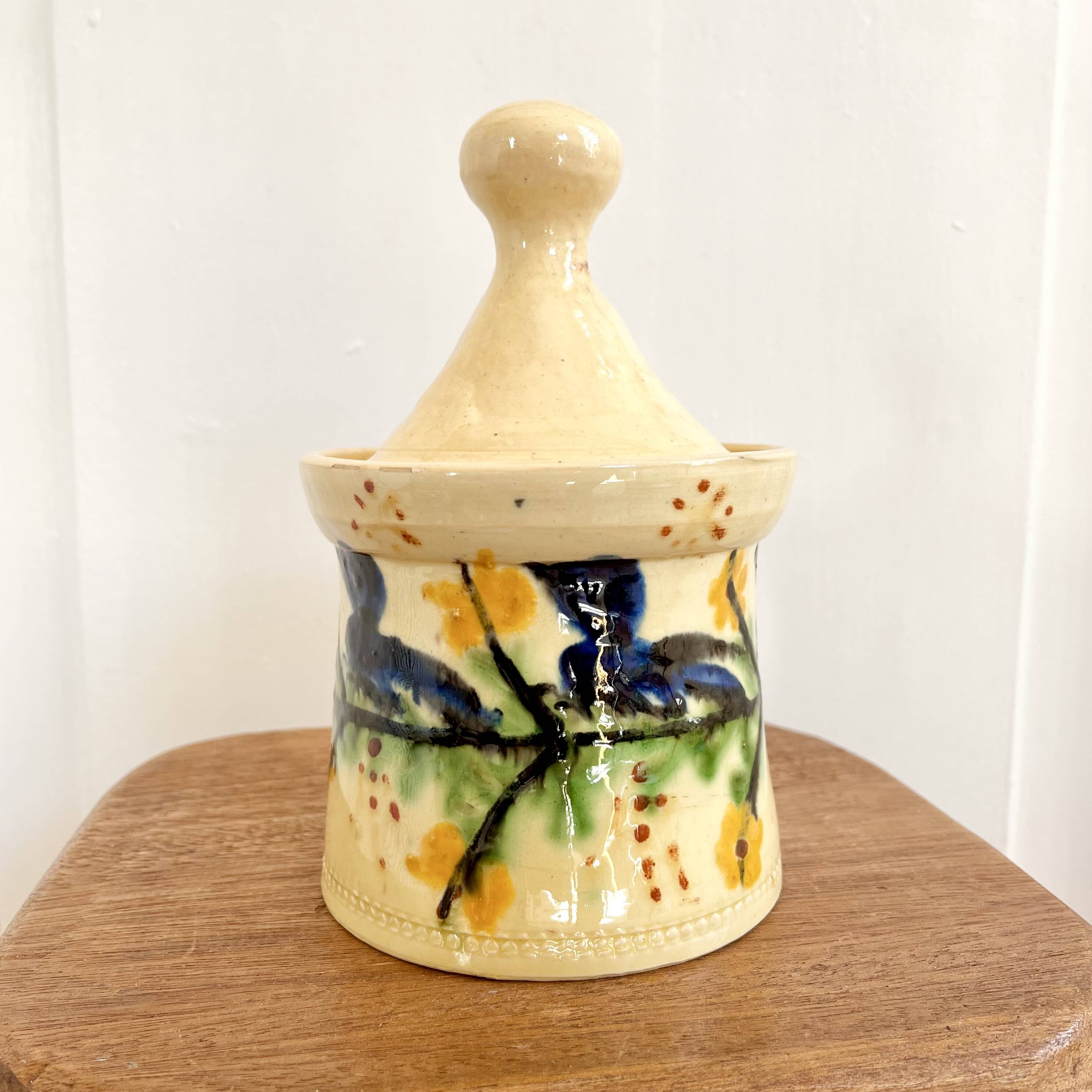 Hand painted ceramic covered pot