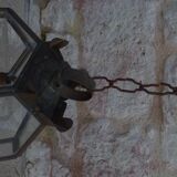 Old lantern in brass and glass with 8 facets or 24 stained glass windows