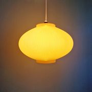 Vintage oval-shaped suspension in pleated celluloid, light green colour, 1960.