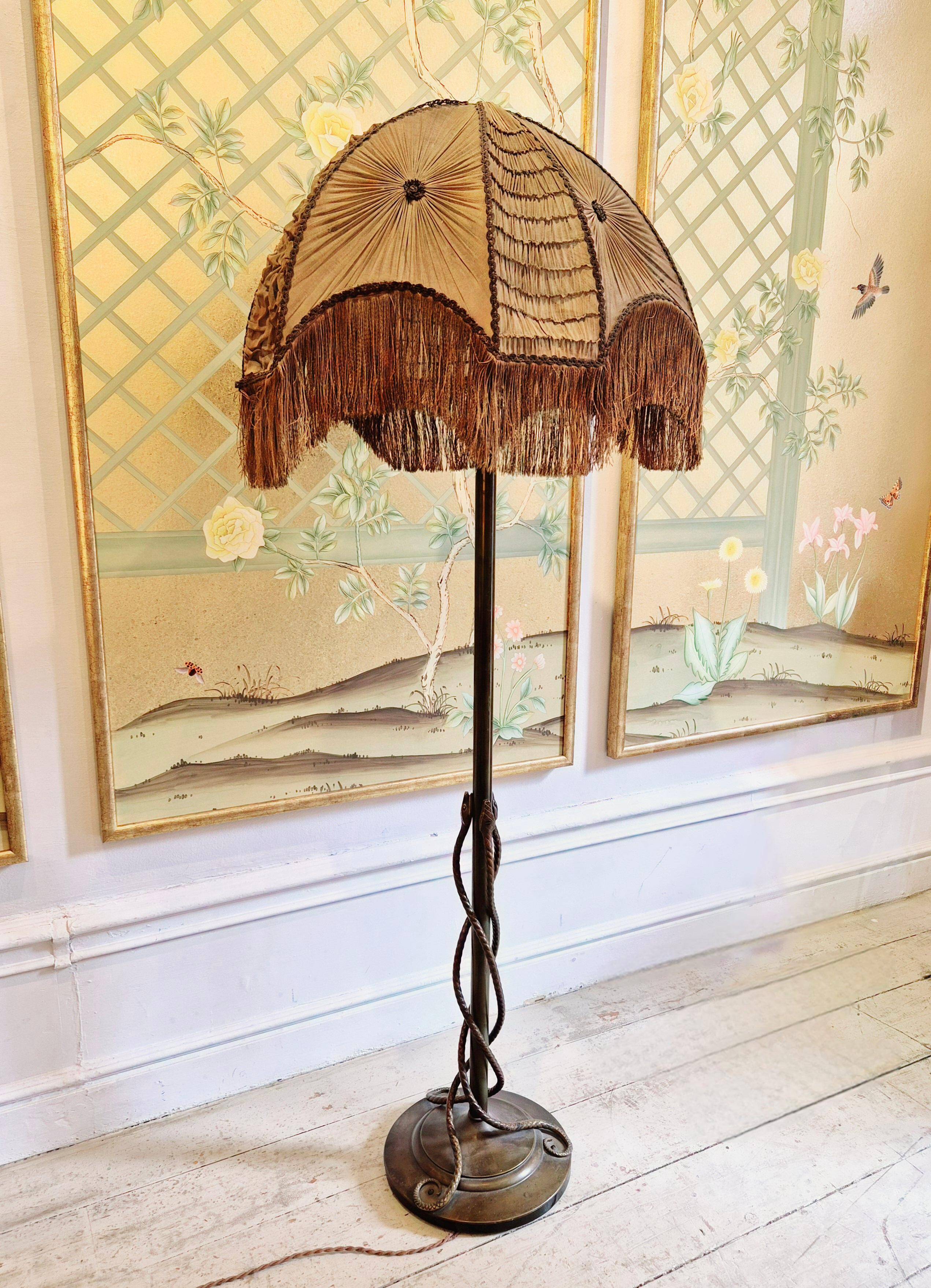 Rare and exquisite bronze floor lamp with intertwined snakes, early 1900s.