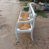 Wooden bench with straw pad