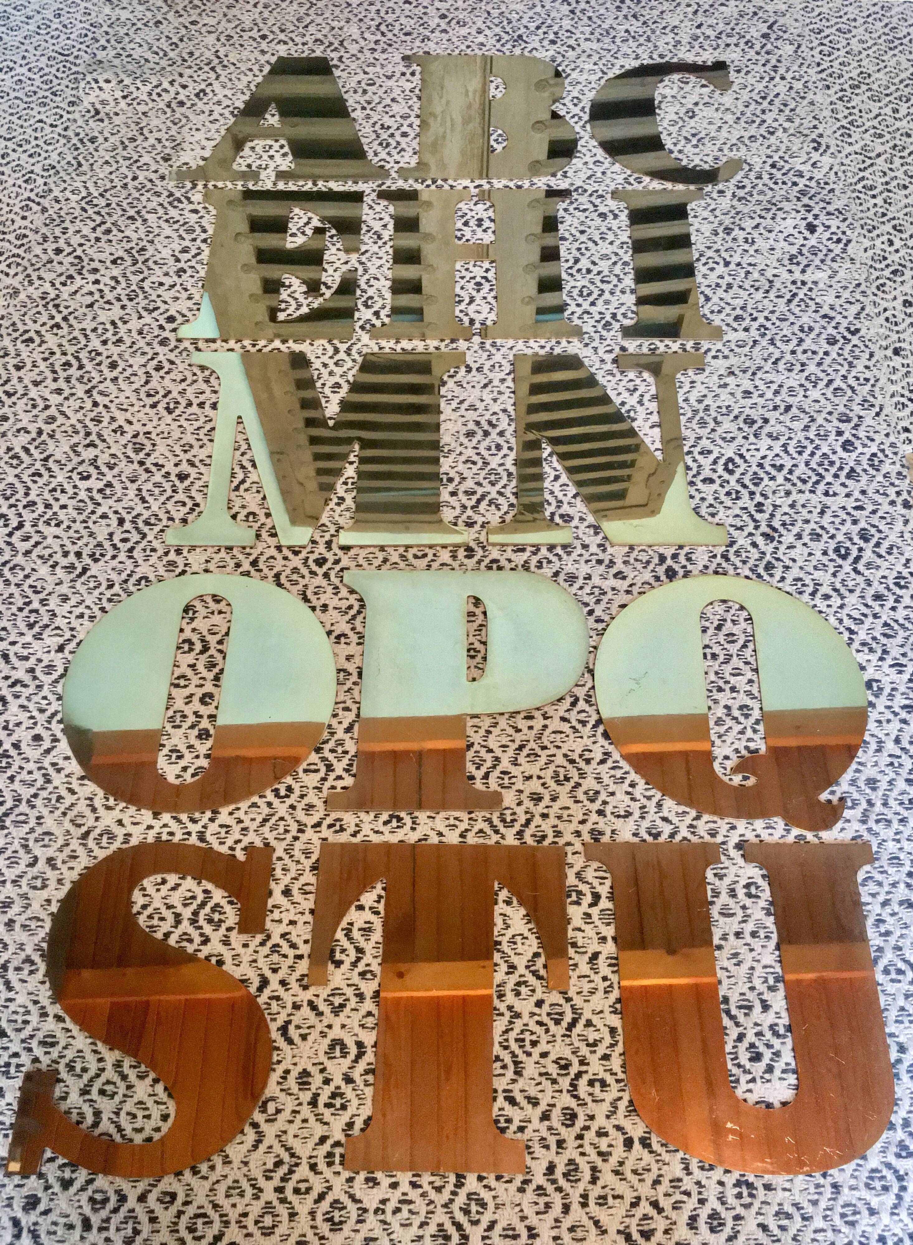 Old store brass sign letter