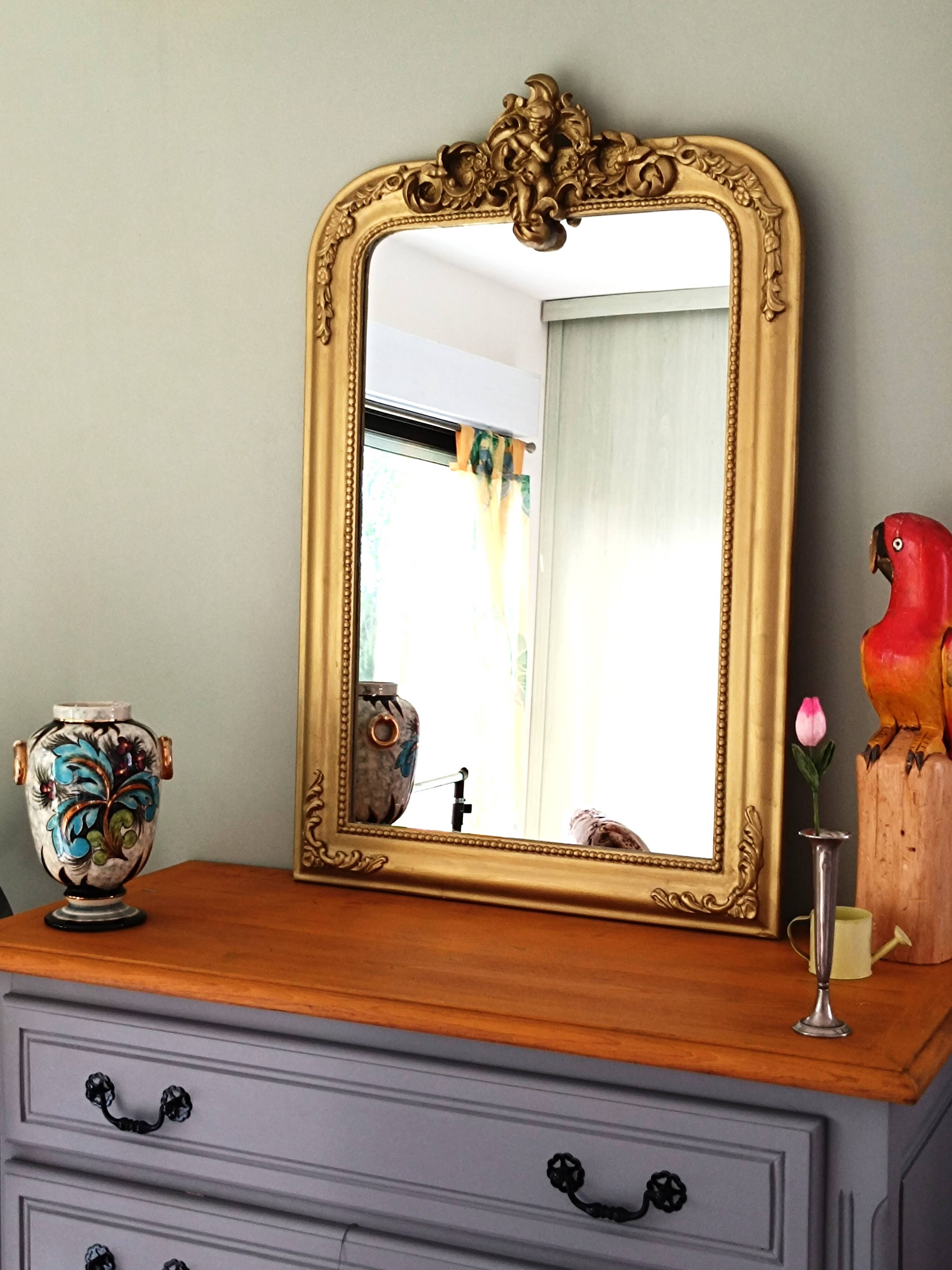 Gilded mirror with a Louis Philippe style pediment