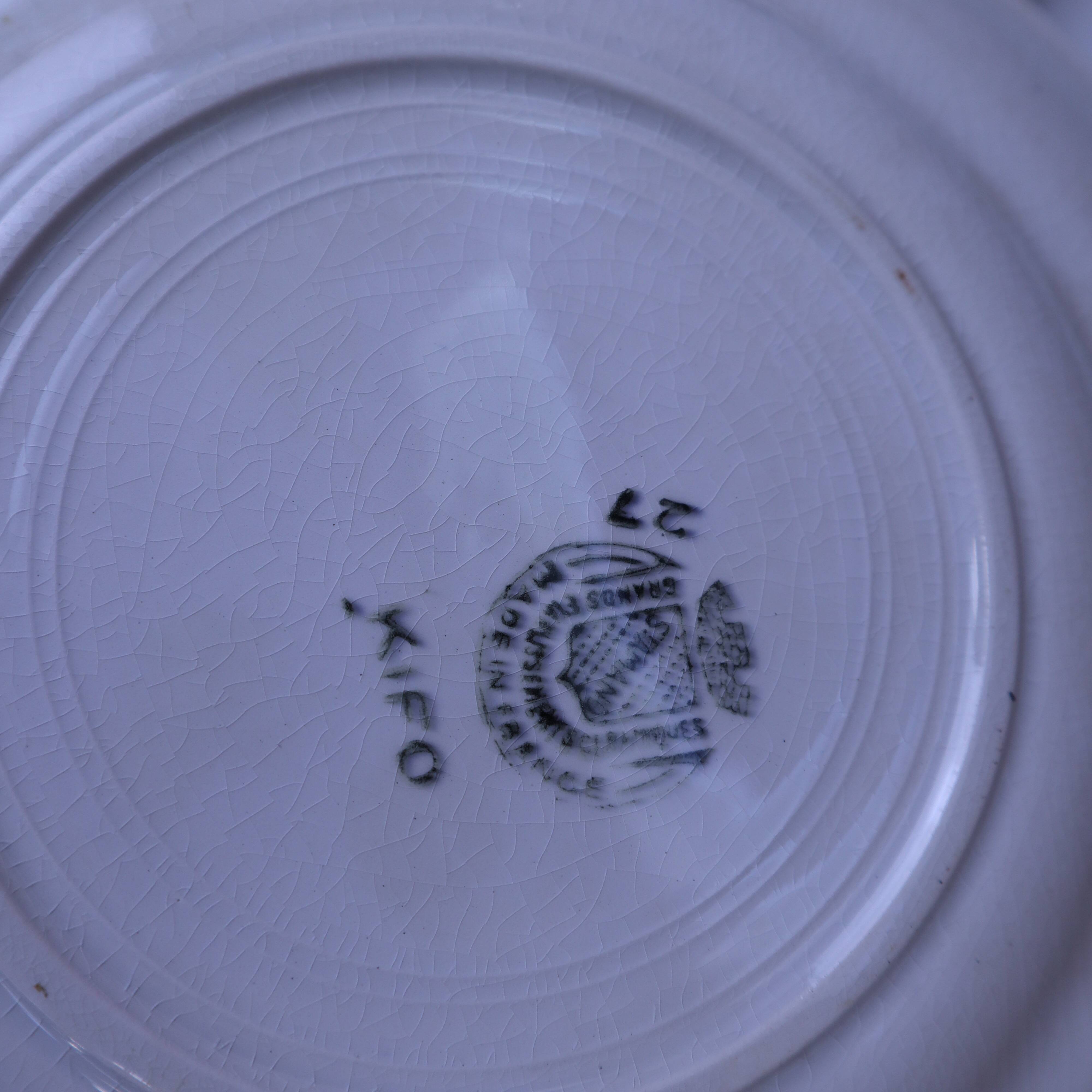 Set of 6 KIFO L'Amandinoise flat plates with green leaf design.