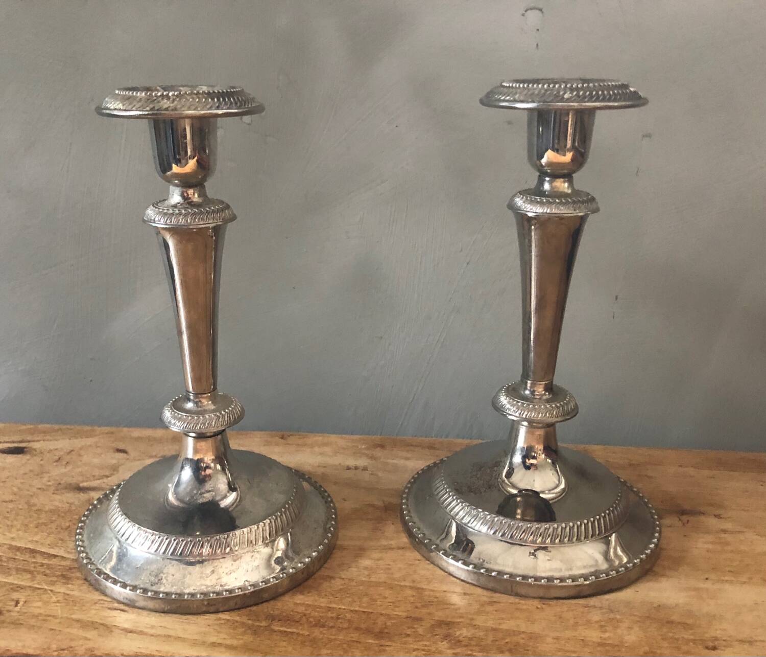 Silver metal candle holders that can be paired.