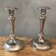 Silver metal candle holders that can be paired.