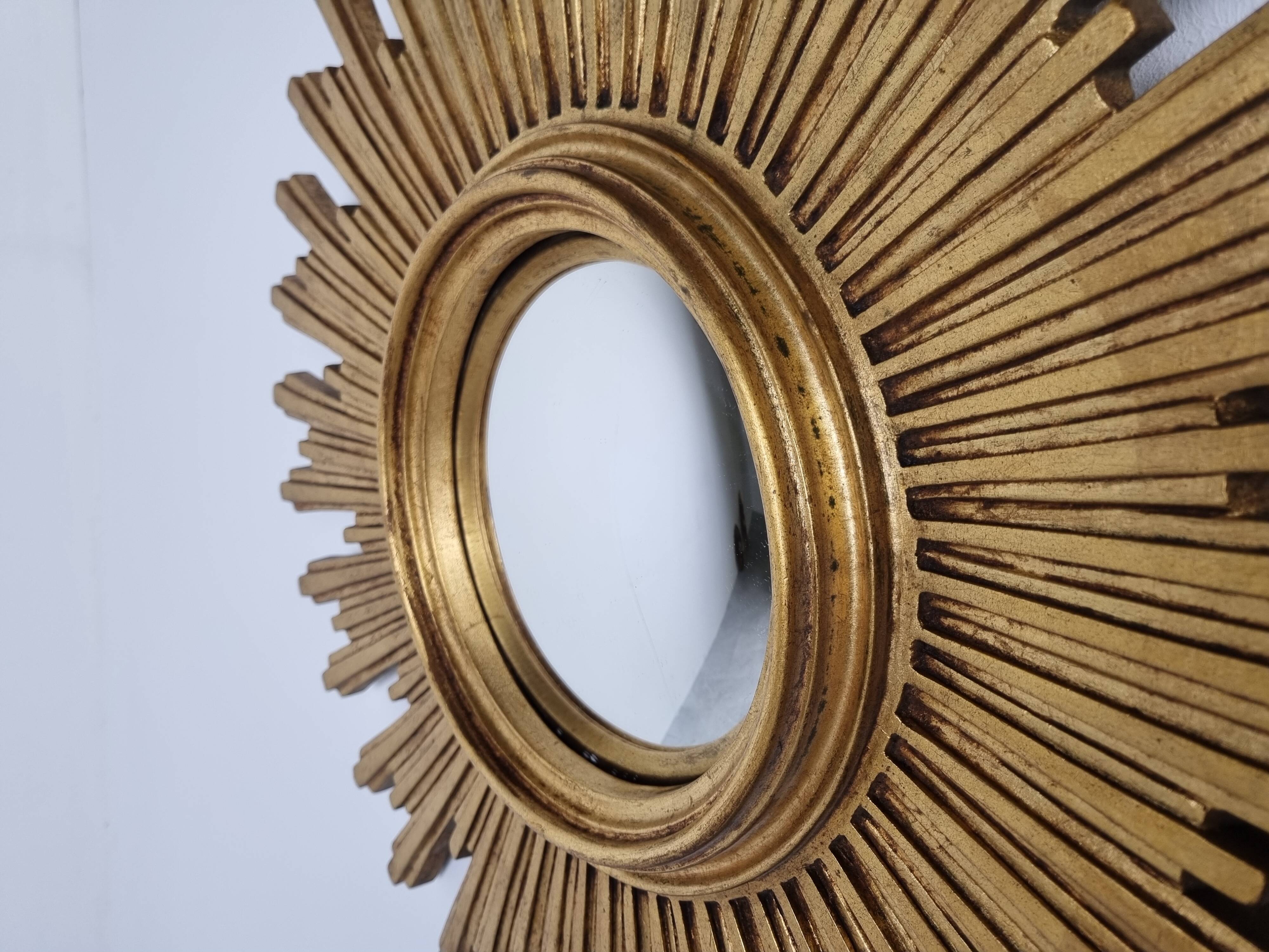 Vintage golden sunburst mirror