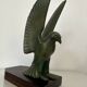 Pair of eagle bookends in green patina regula with rosewood base