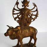 Golden bronze statue of Shiva on Nandi, India, mid-20th century.