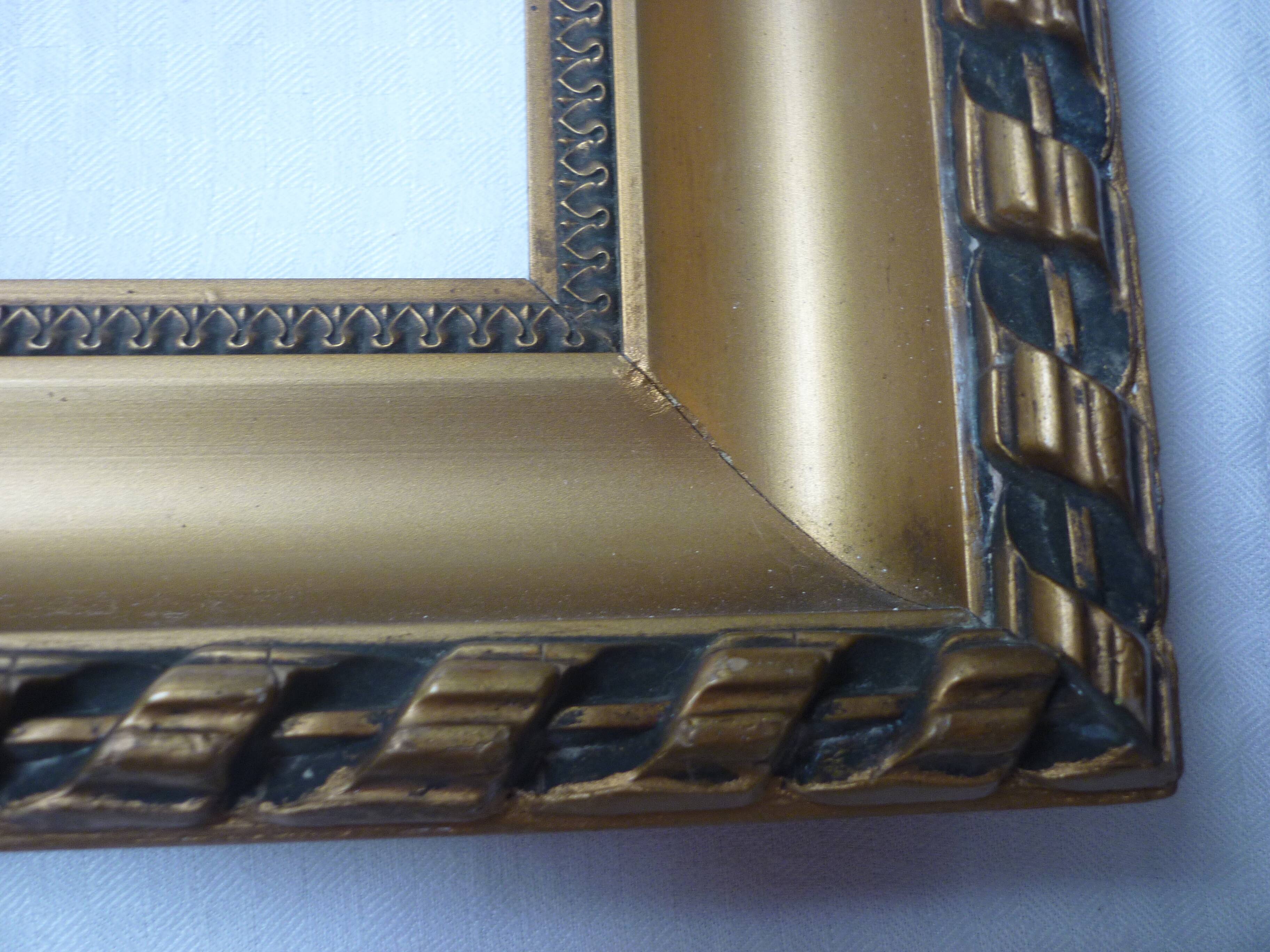 Gilded wood and stucco frame