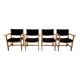 SUITE DE 4 FAUTEUILS ESTAMPILLE "HANS WEGNER" 1960.