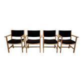 SUITE DE 4 FAUTEUILS ESTAMPILLE "HANS WEGNER" 1960.