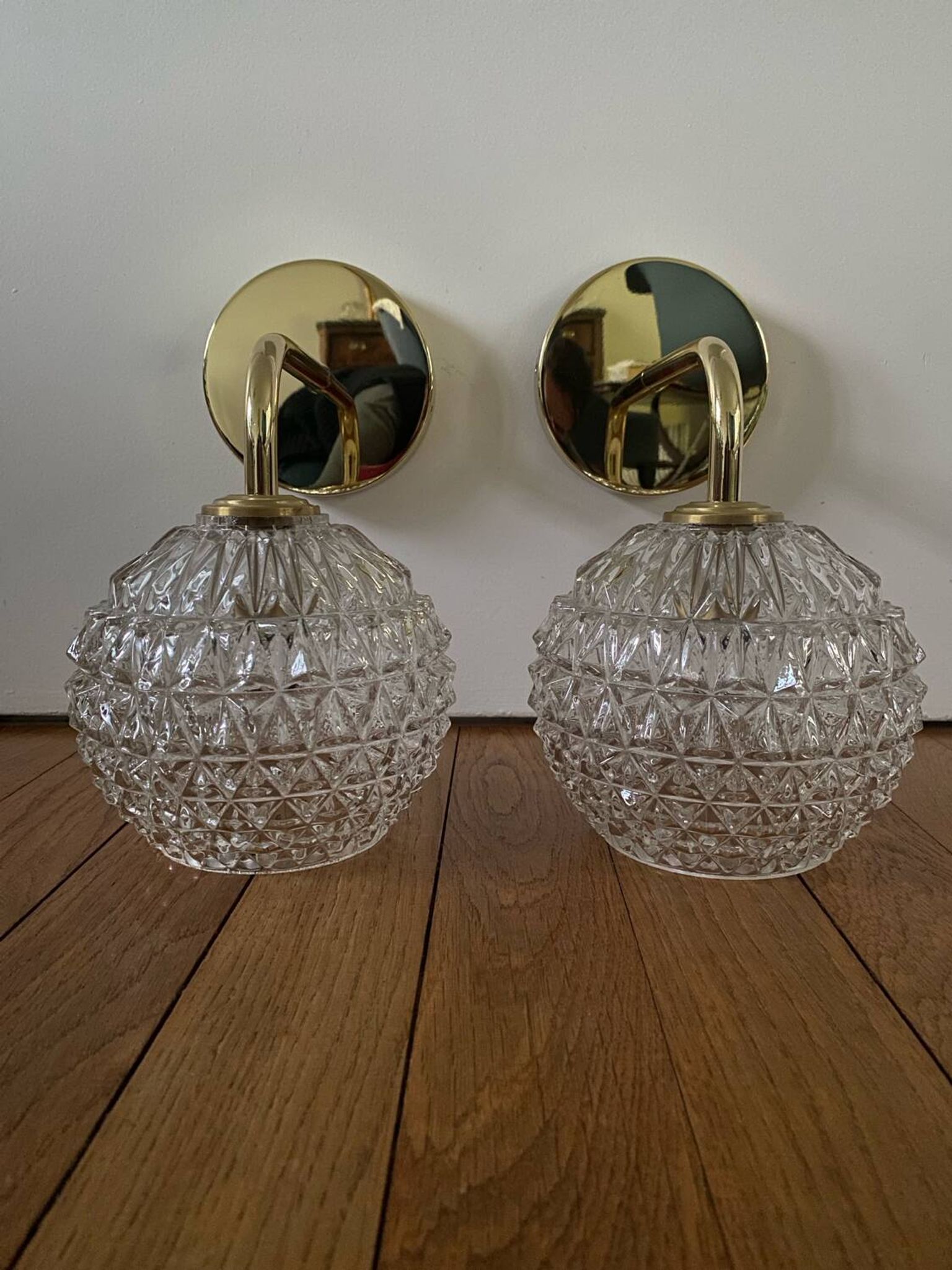 Pair of wall lights with vintage globes