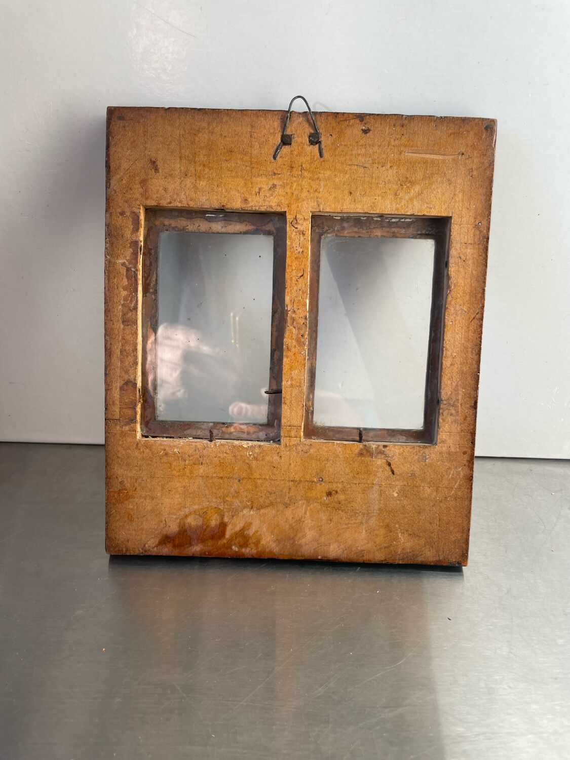 Double frame intricately carved wood