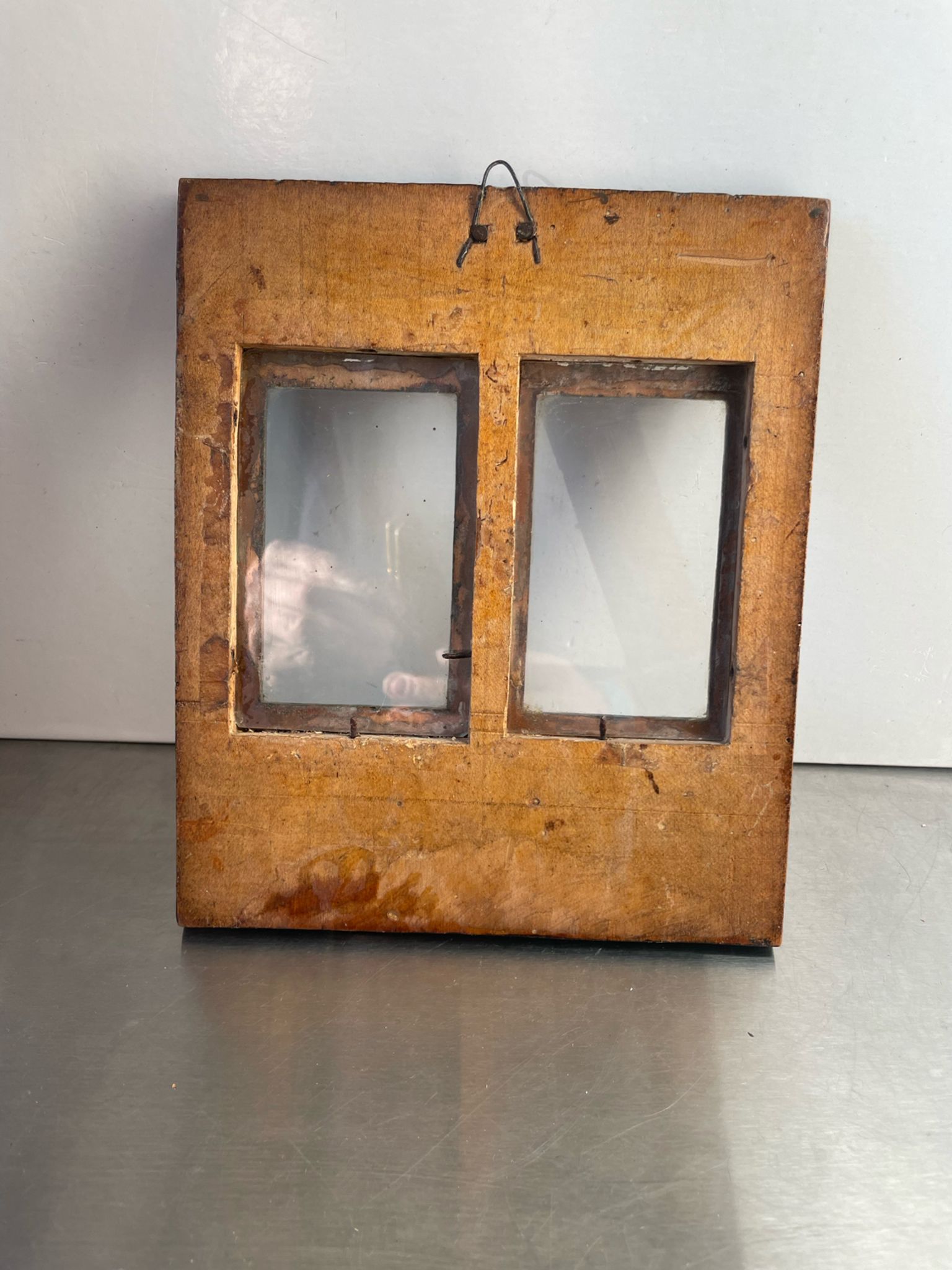 Double frame intricately carved wood