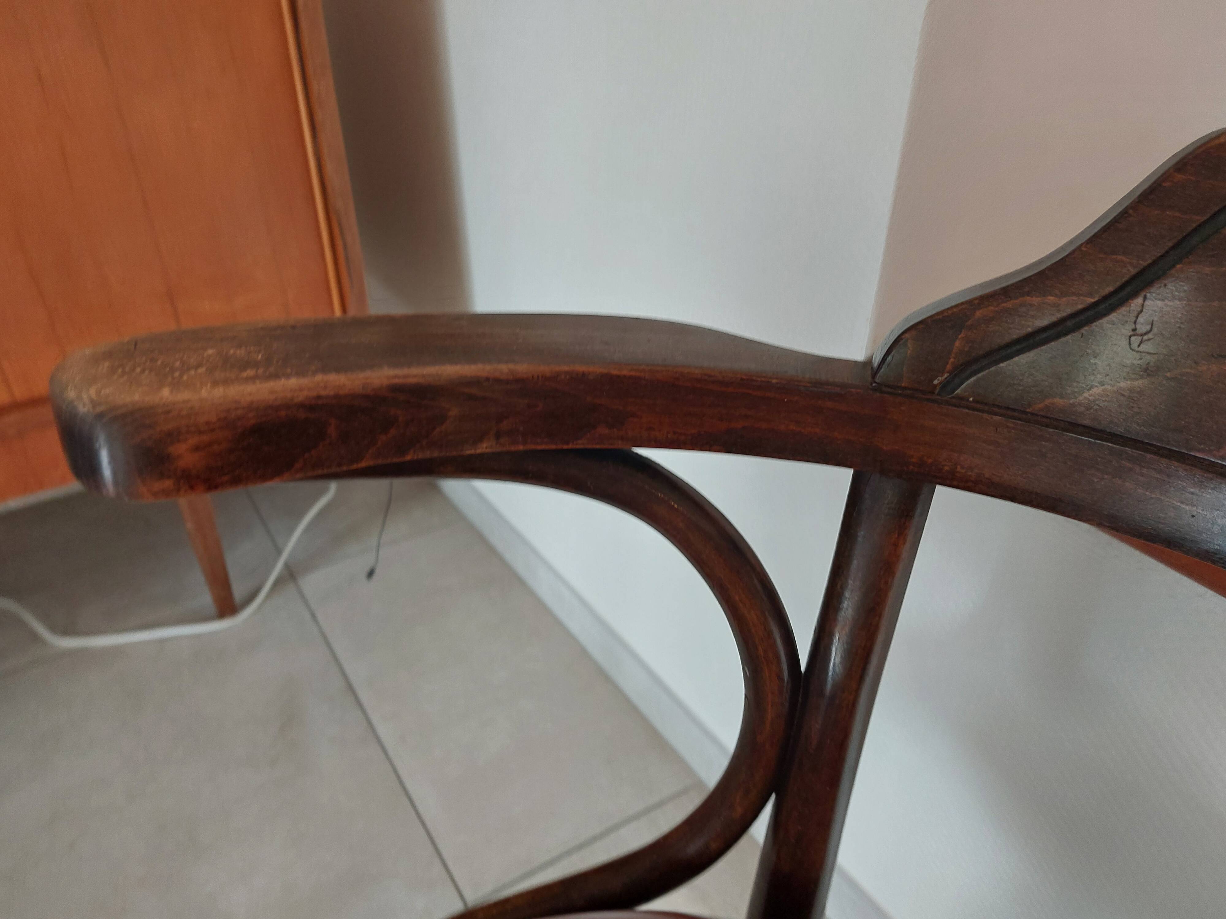 Thonet armchair, swivel, in wood and faux leather.