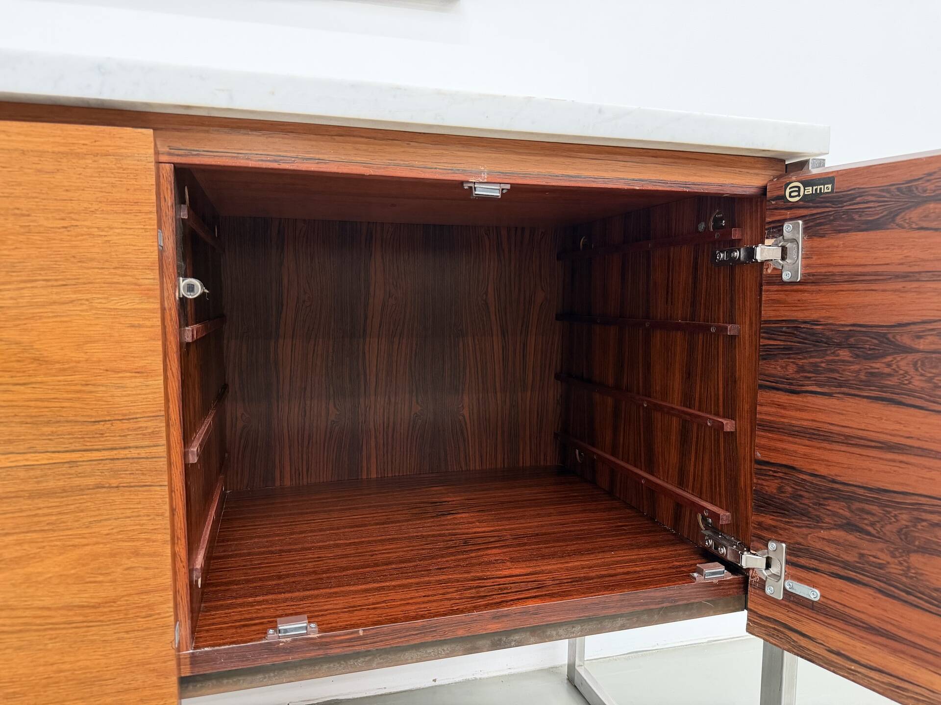 Modernist enfilade by Arno, in Rio rosewood.