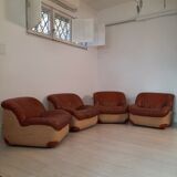 Four vintage armchairs, leather and fabric, 70s
