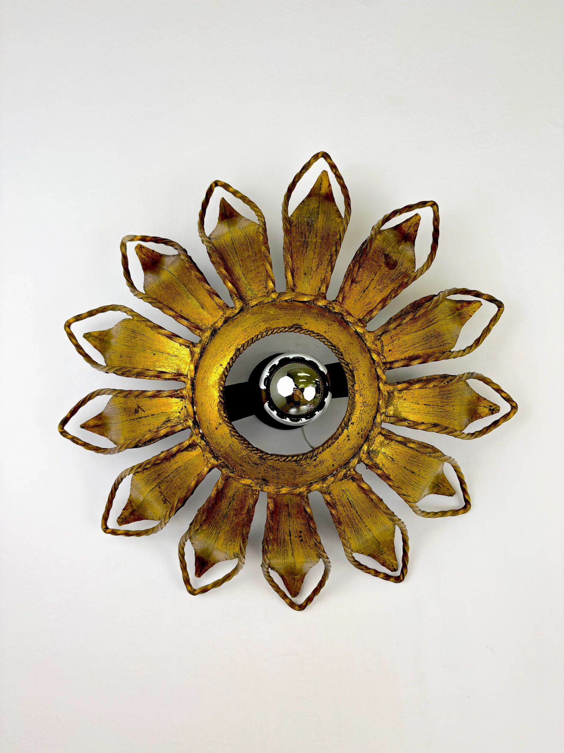 Spanish sunburst ceiling light fixture or sconce in gilt iron, circa 1960