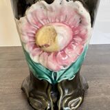 Antique ceramic vase by De Bruyn with floral decoration.