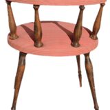 Pink gondola armchair in the style of Helmut.