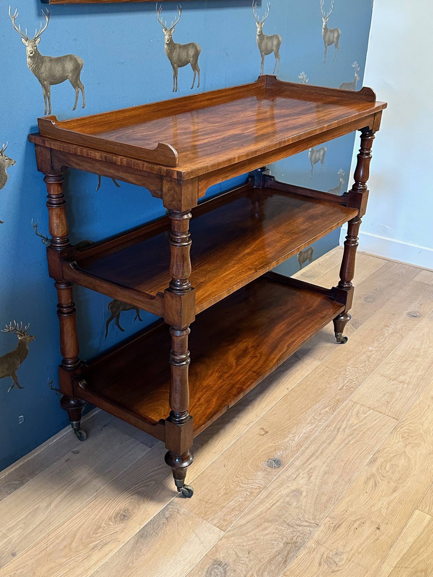 antique mahogany three-tiered étagère