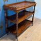 antique mahogany three-tiered étagère