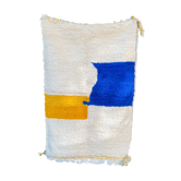 Berber carpet béni ouarain modern white with abstract patterns mustard yellow and blue majorelle