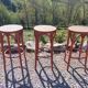 3 wooden bar stools with caning