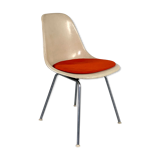 DSX chair with red cushion by Charles and Ray Eames edited by Herman Miller, 1960