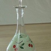 Glass carafe with enamel decoration of cherries.