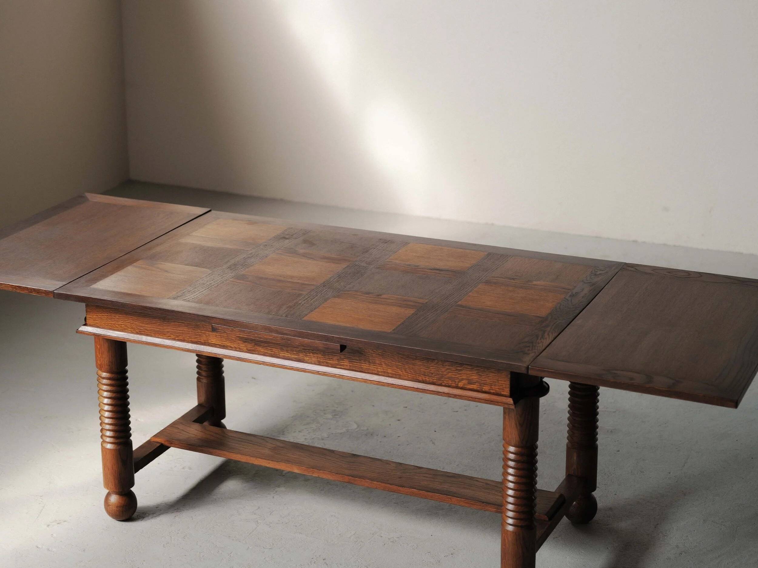 Modernist oak dining table, France, 1940–1950